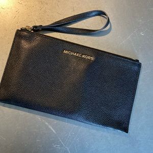 Michael Kors slim clutch. Leather